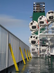 SX03044 Yellow on supports on car ferry railing and green chimney.jpg